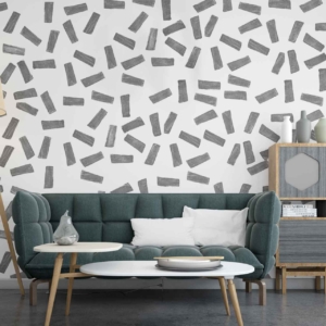 Stamp It - a wallpaper made up of various scattered stamps by Cara Saven Wall Design