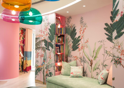 Palm Therapy is a wallpaper installed in a lounge, Art Deco lights and couches have been used